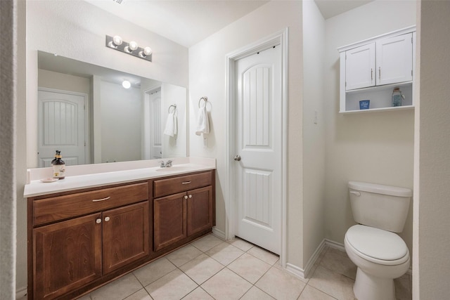 2278 Bryant Ln, Fate, TX 75189 - bathroom featuring tile patterned flooring, vanity, toilet, and baseboards