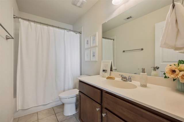 2278 Bryant Ln, Fate, TX 75189 - full bathroom with toilet, tile patterned floors, vanity, and shower / bath combo