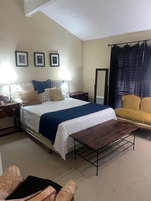 bedroom featuring vaulted ceiling with beams and carpet floors