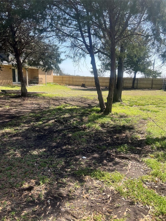 view of yard with fence