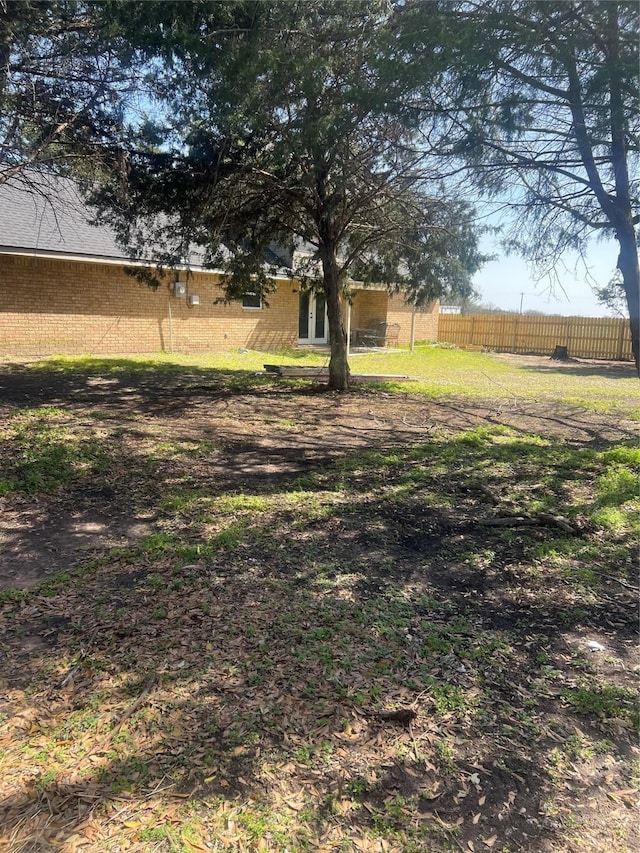 view of yard with fence