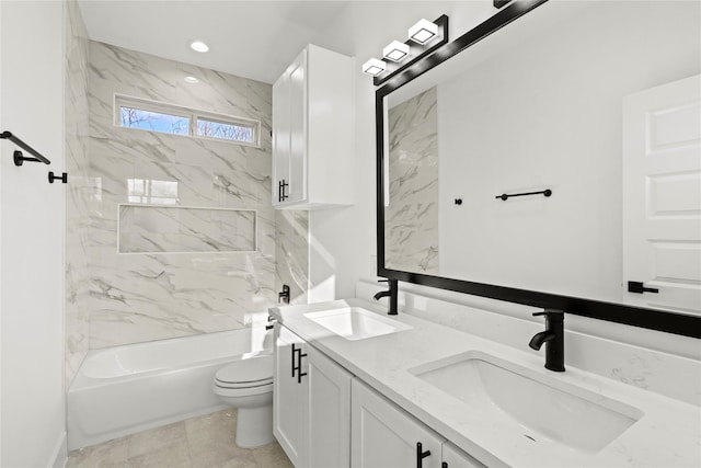 full bath featuring bathtub / shower combination, a sink, toilet, and double vanity