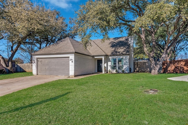 view of front of property featuring concrete driveway, brick siding, a front yard, and fence