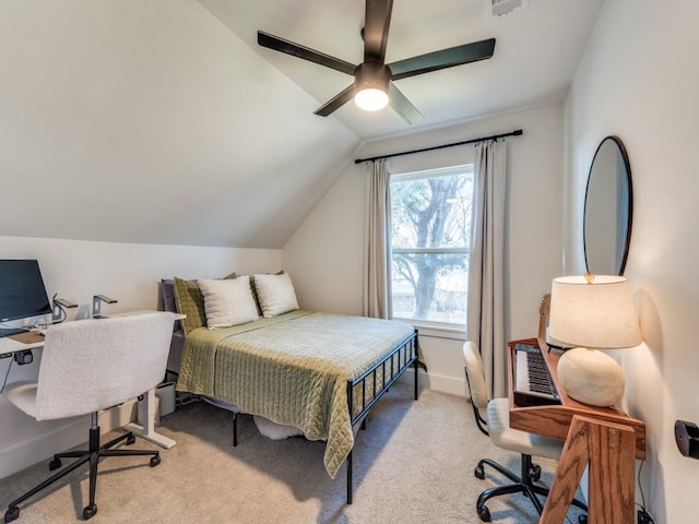 bedroom with ceiling fan, carpet flooring, visible vents, baseboards, and vaulted ceiling