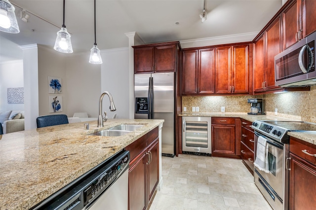 kitchen featuring a sink, decorative backsplash, stainless steel appliances, wine cooler, and dark brown cabinets