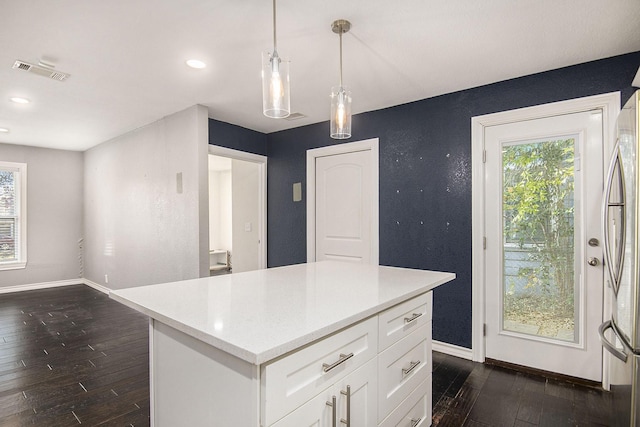 walk in closet with dark wood-style floors and visible vents