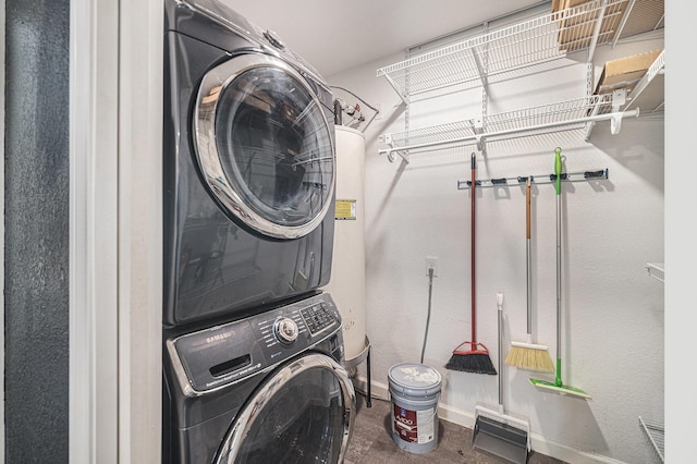 4312 Diaz Ave, Fort Worth, TX 76107 - laundry room with stacked washing machine and dryer and baseboards