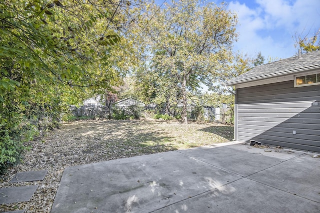 view of yard featuring a patio and a fenced backyard