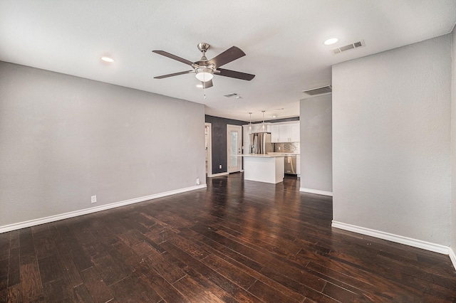 4312 Diaz Ave, Fort Worth, TX 76107 - unfurnished living room with a ceiling fan, dark wood-type flooring, and recessed lighting