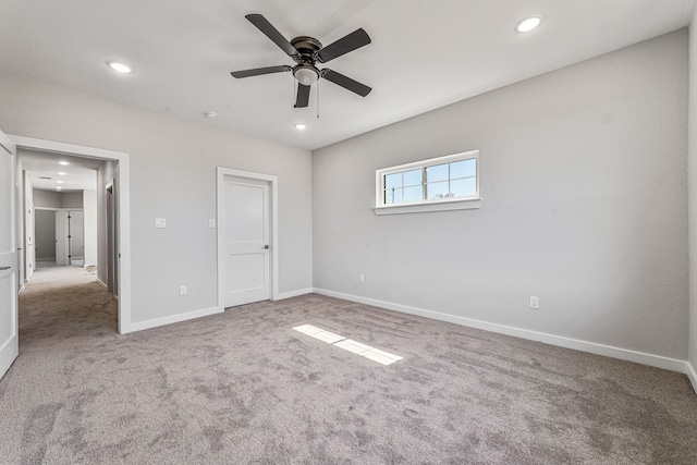 unfurnished bedroom with recessed lighting, carpet flooring, a ceiling fan, and baseboards