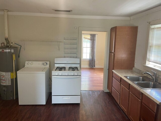 209 S Roosevelt St, Minden, LA 71075 - kitchen with water heater, washer / clothes dryer, white range with gas cooktop, a sink, and dark wood-style flooring