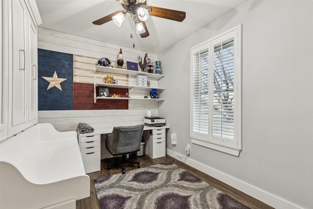 office with dark wood-style flooring, ceiling fan, and baseboards