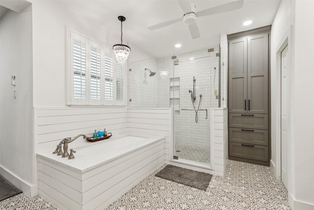 bathroom featuring a stall shower, a ceiling fan, tile patterned floors, a garden tub, and recessed lighting