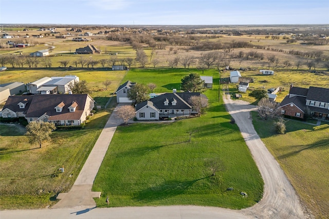 birds eye view of property with a residential view and a rural view