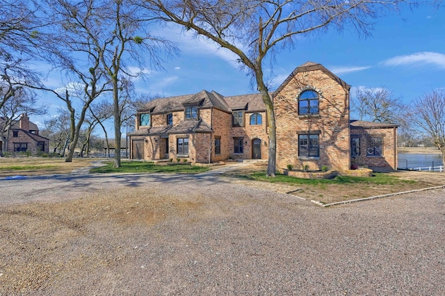 view of front of property with brick siding