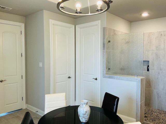 dining area featuring visible vents and baseboards