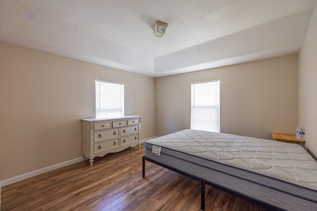 kitchen with plenty of natural light, freestanding refrigerator, light countertops, and a sink