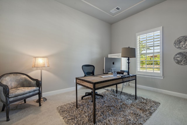 home office featuring carpet, visible vents, and baseboards