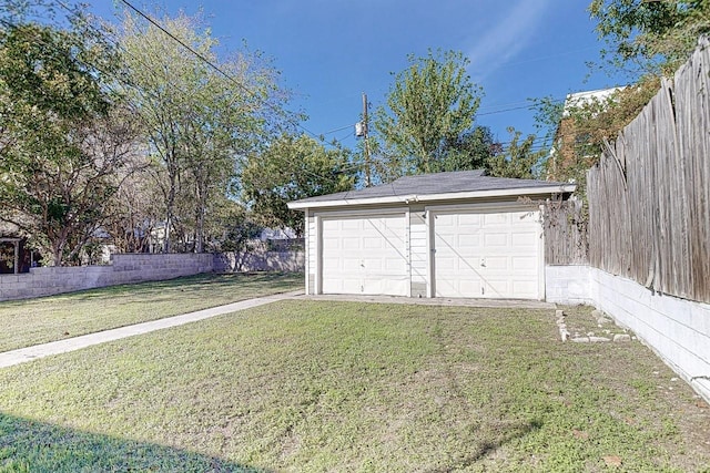 detached garage with fence