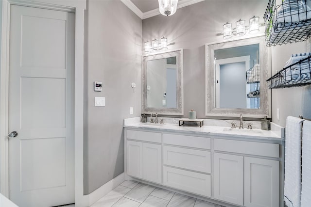 bathroom with double vanity, marble finish floor, ornamental molding, and a sink