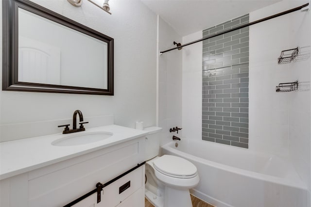 bathroom featuring shower / washtub combination, vanity, and toilet