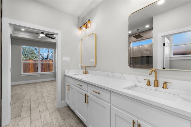 bathroom featuring double vanity, a ceiling fan, a sink, and recessed lighting