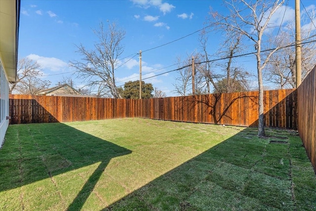 view of yard featuring a fenced backyard