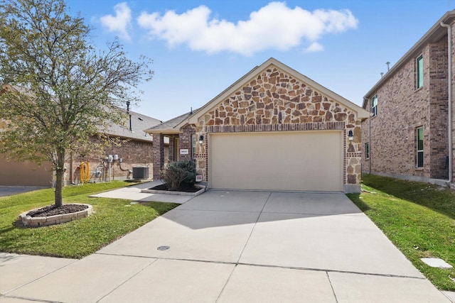 view of front facade featuring central AC unit, an attached garage, brick siding, concrete driveway, and stone siding