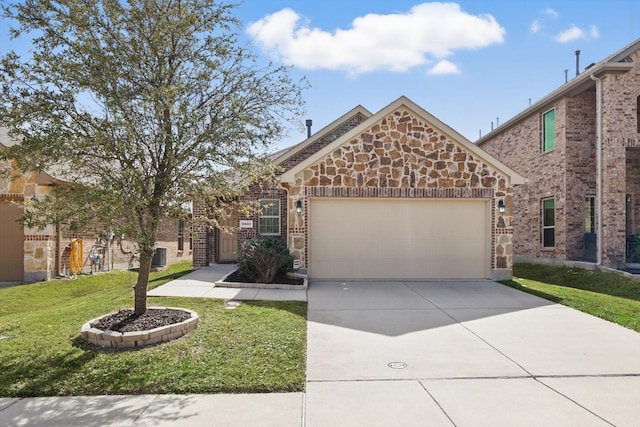 view of front of property featuring a garage, brick siding, stone siding, driveway, and a front yard