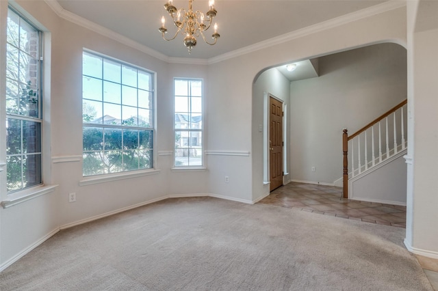 interior space with arched walkways, carpet flooring, a chandelier, and crown molding