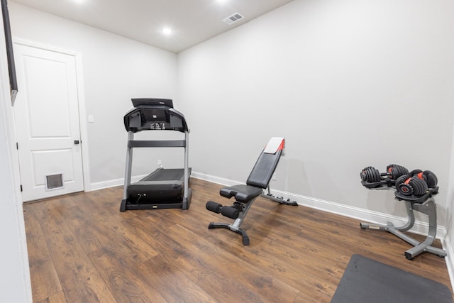 workout room with recessed lighting, wood finished floors, visible vents, and baseboards