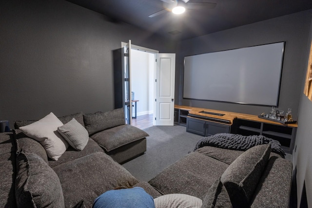 home theater with carpet floors and a ceiling fan