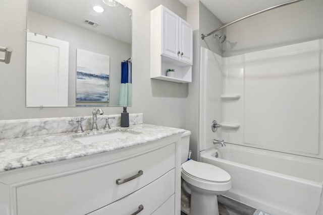 full bathroom featuring toilet, shower / bathing tub combination, vanity, and visible vents