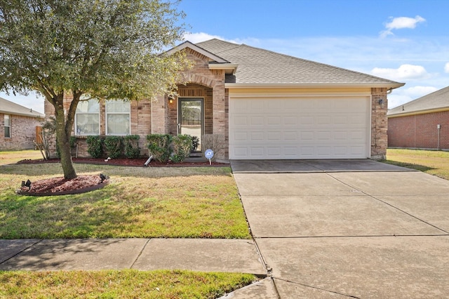 single story home with roof with shingles, brick siding, concrete driveway, a garage, and a front lawn