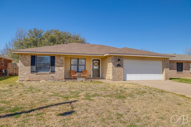 ranch-style home featuring brick siding, concrete driveway, a front yard, a garage, and cooling unit