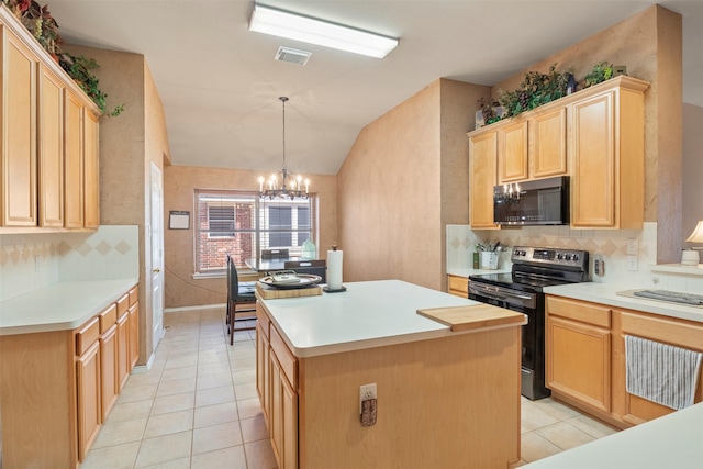 kitchen with light tile patterned floors, visible vents, stainless steel appliances, and light brown cabinetry