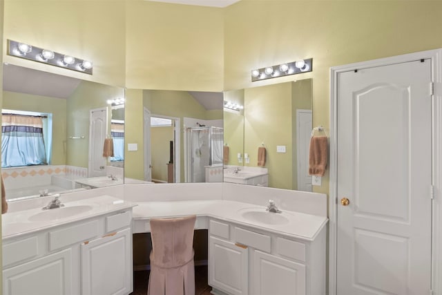 full bathroom with lofted ceiling, a shower stall, and vanity