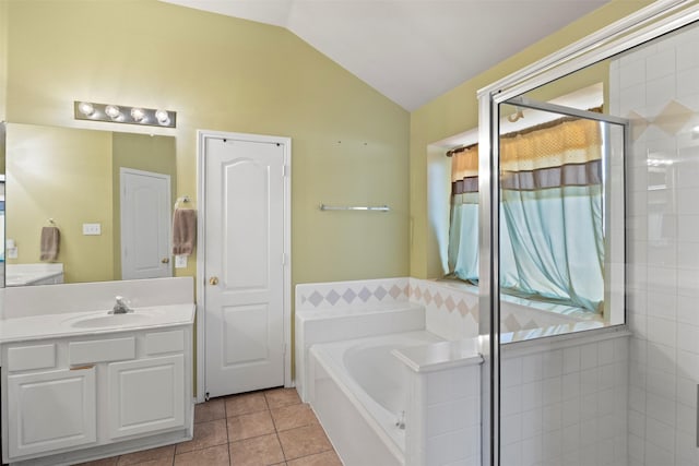 full bath with a garden tub, tile patterned flooring, vaulted ceiling, vanity, and a shower stall