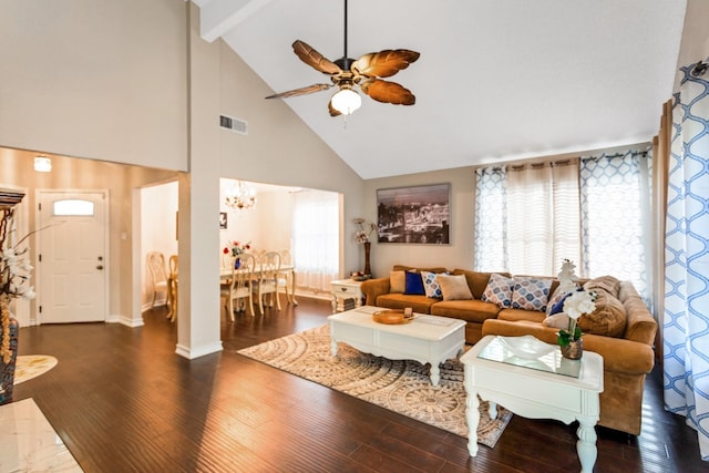 living room with ceiling fan with notable chandelier, beamed ceiling, wood finished floors, and visible vents