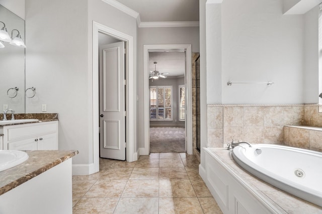 bathroom featuring ceiling fan, tile patterned floors, a jetted tub, crown molding, and vanity