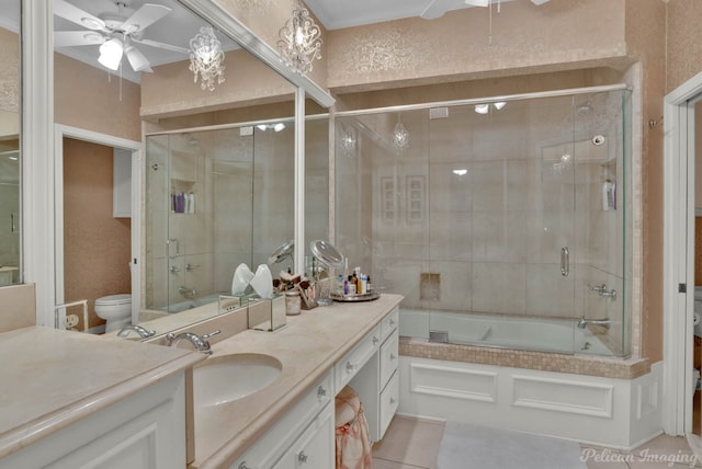 full bath featuring bath / shower combo with glass door, a ceiling fan, toilet, tile patterned floors, and vanity