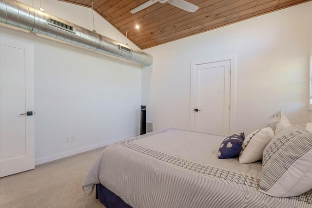 bedroom with baseboards, visible vents, light colored carpet, lofted ceiling, and wooden ceiling