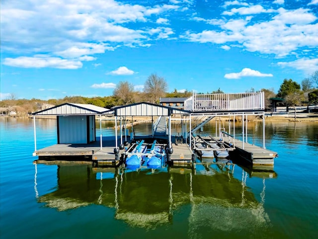 view of dock featuring a water view and boat lift