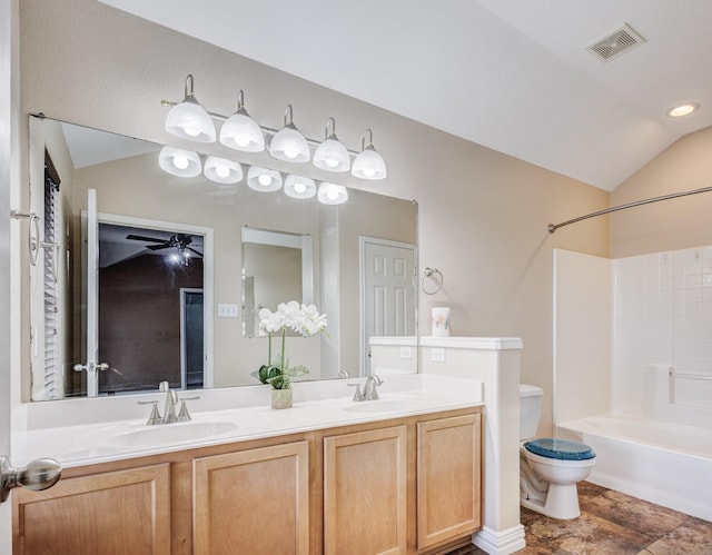 full bathroom with visible vents, vaulted ceiling, and a sink