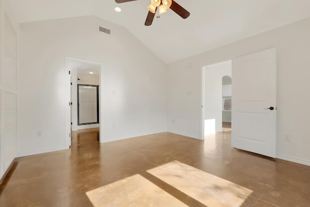 unfurnished room featuring arched walkways, visible vents, ceiling fan, concrete flooring, and baseboards