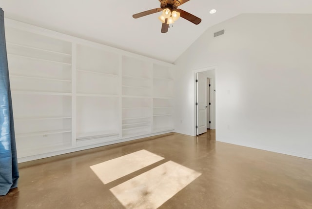 spare room featuring finished concrete flooring, ceiling fan, built in shelves, and visible vents