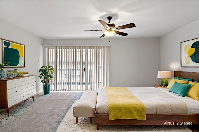 bedroom featuring a ceiling fan, carpet flooring, and access to outside