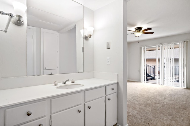 bathroom with vanity and a ceiling fan