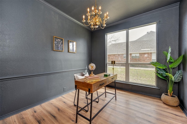 office area featuring plenty of natural light, ornamental molding, wood finished floors, and a textured wall