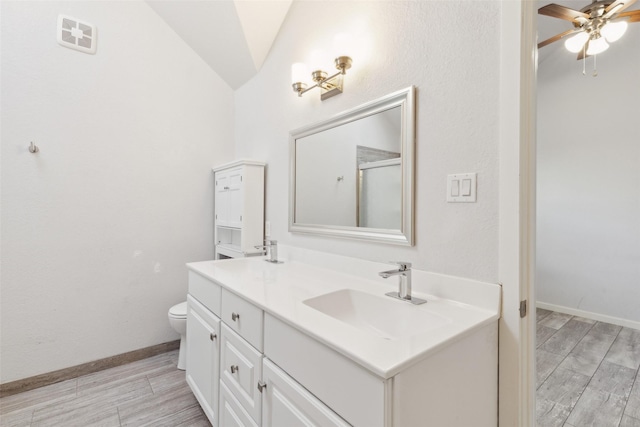 full bath with toilet, a sink, a shower with door, double vanity, and wood tiled floor